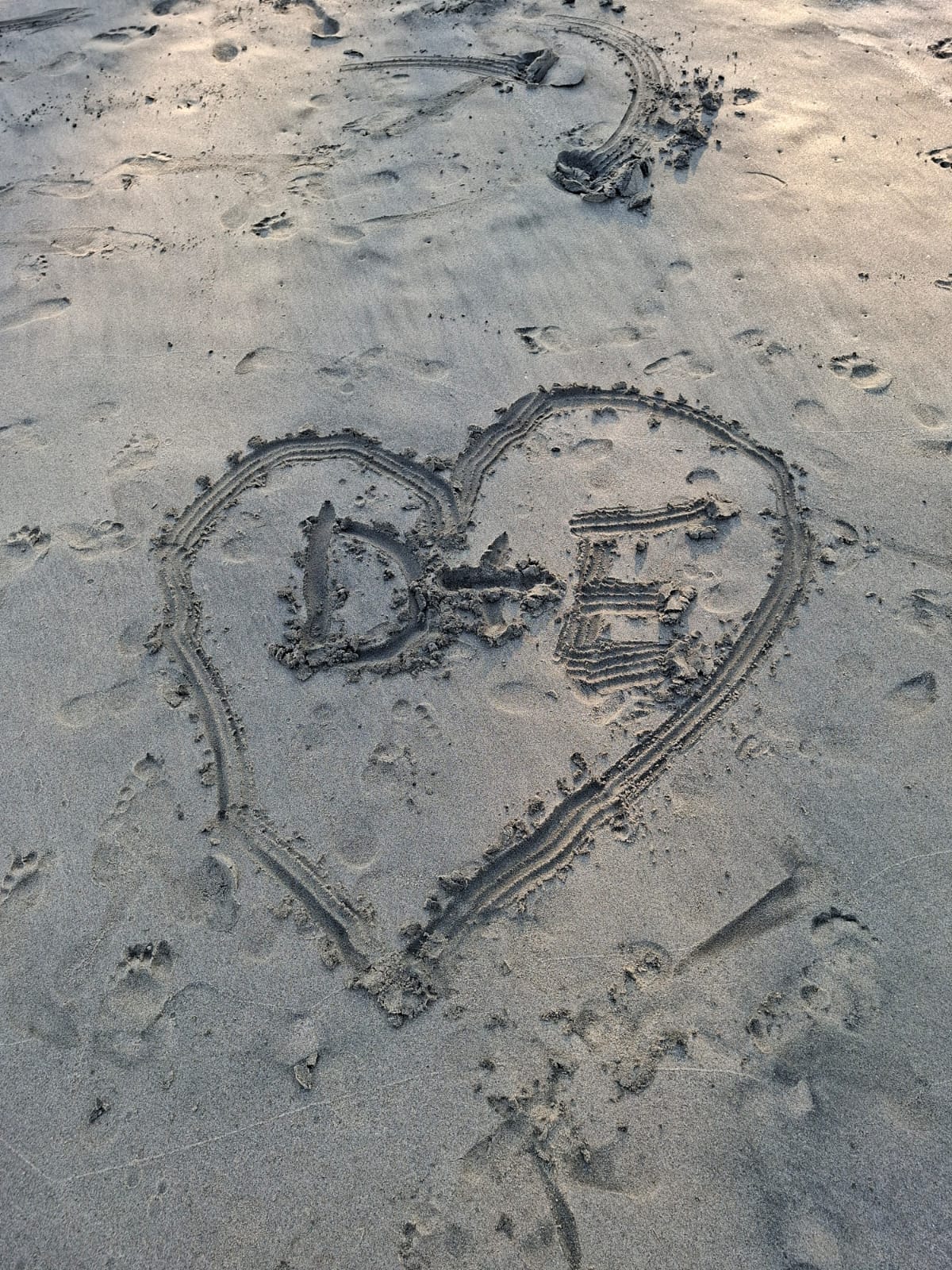D + E in het zand